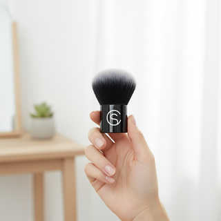 Care for Skin Kabuki Brush in hand