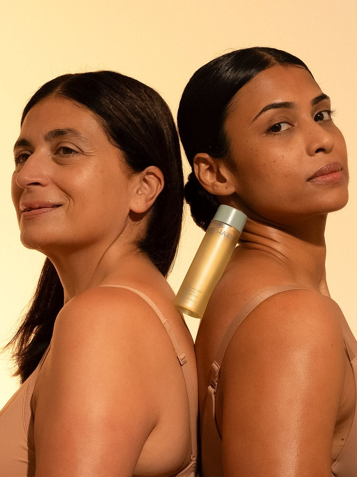 Alpha-H Firming Peptide Body Oil twee modellen met fles
