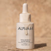 Alpha-H Hyaluronic 8 Super Serum flacon op zandsteen