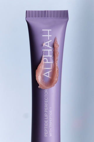 Alpha-H Peptide Lip Perfector tube met textuur