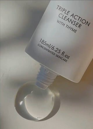 Alpha-H Triple Action Cleanser tube met gel-druppel