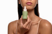 Alpha-H Vitamin A Serum model met flacon
