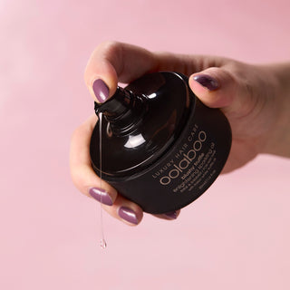 Oolaboo Blushy Truffle Sparkling Oil met vallende oliedruppel