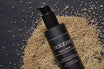 Oolaboo Bouncy Bamboo Repair Shampoo op een bed van zaadjes