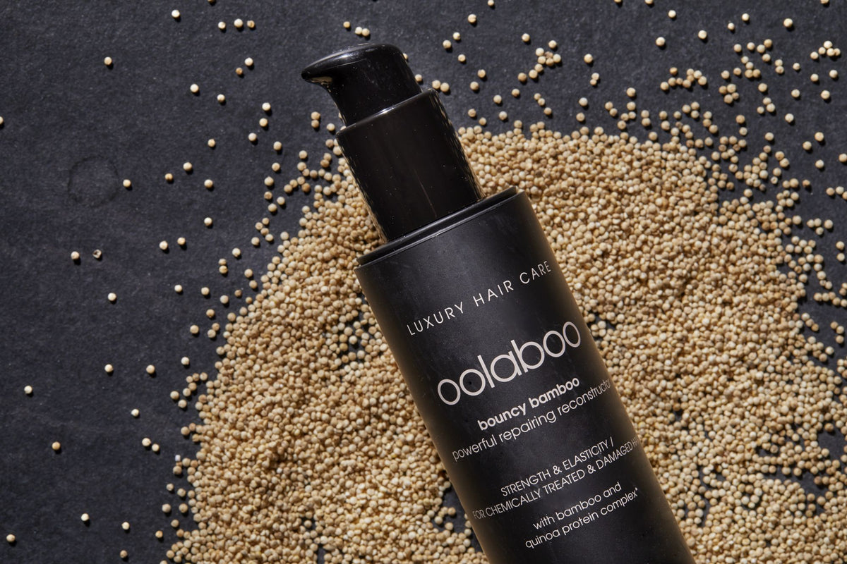 Oolaboo Bouncy Bamboo Repair Shampoo op een bed van zaadjes