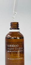 Oolaboo Super Foodies Matcha Infused Oil close-up met oliedruppel