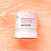 Sensilis Skin Glow Glycolic Brightening Gel 50ml pot met textuur op oranje